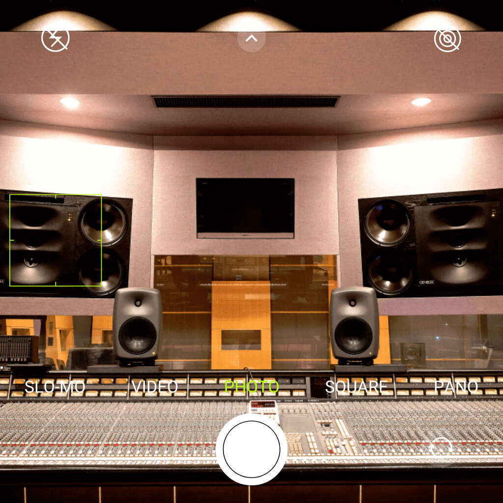 recording studio with ssl mixing console and genelec studio monitors.