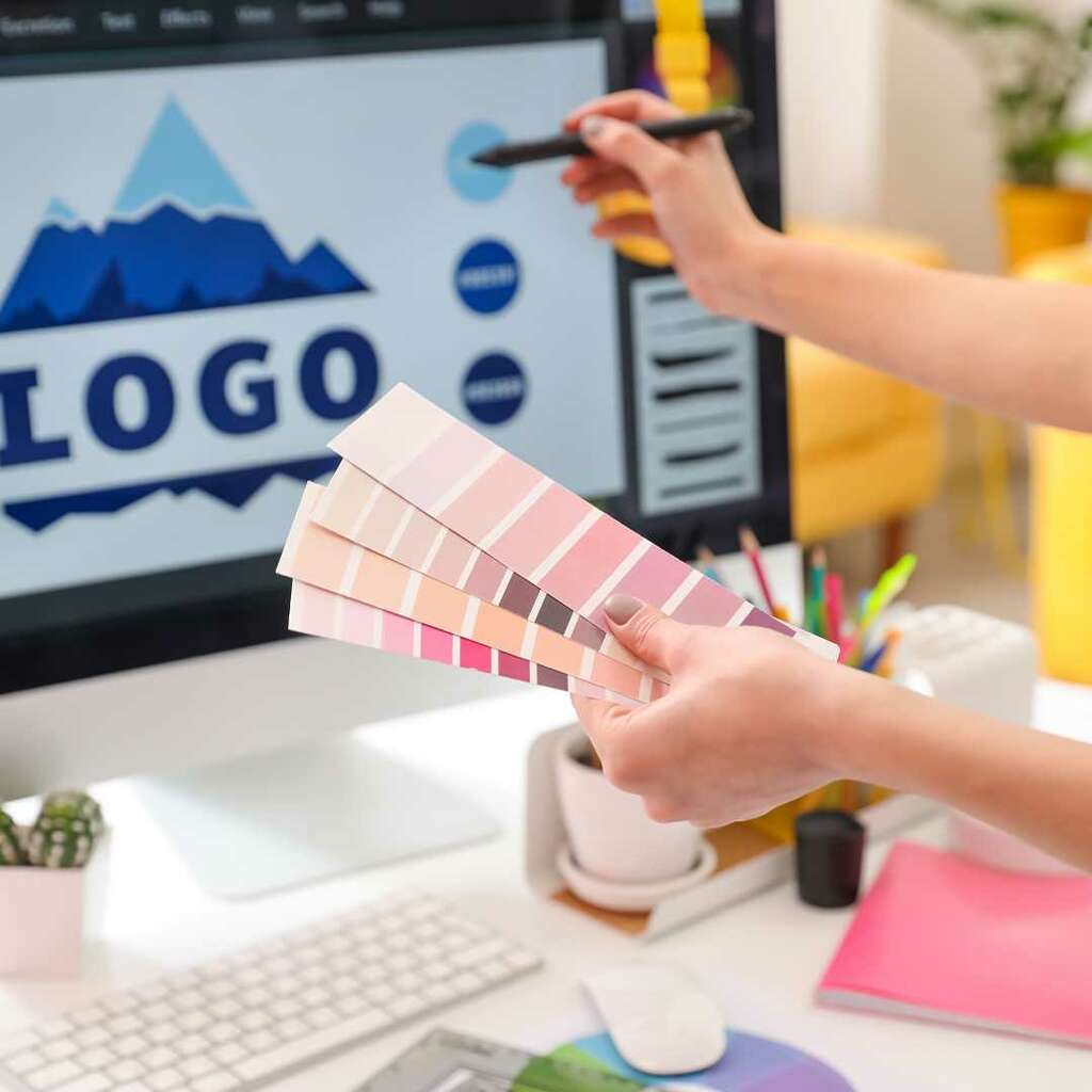 image of graphic designer making a lame logo